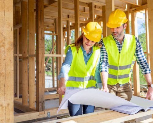 team-of-young-man-and-woman-engineers-and-architec-XDS3XLL